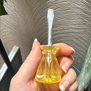 Yellow vintage Handheld flathead Screwdriver hand tools